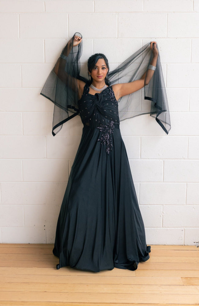 Nivaraine Black One-piece Gown styled on a model for visual reference